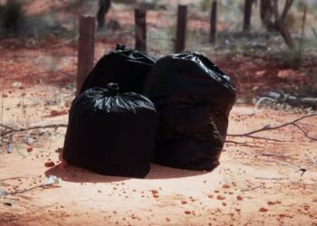 VideoHive Closeup of Full Trash Bags on the Sand 43426495