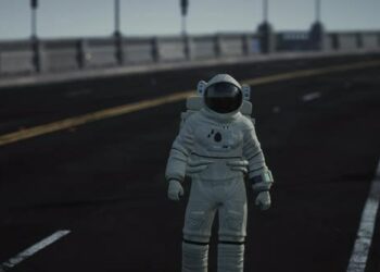 VideoHive Astronaut Walks in the Middle of a Road 47581947