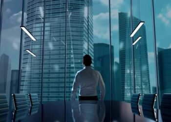 VideoHive Energy Storage Businessman Working in Office Among Skyscrapers Hologram Concept 47581335