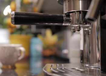 VideoHive Placing the coffee cup in place, to be filled 41005487