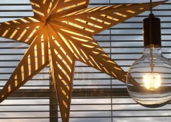 VideoHive Closeup of christmas decorations in window, storm clouds in background 46808127